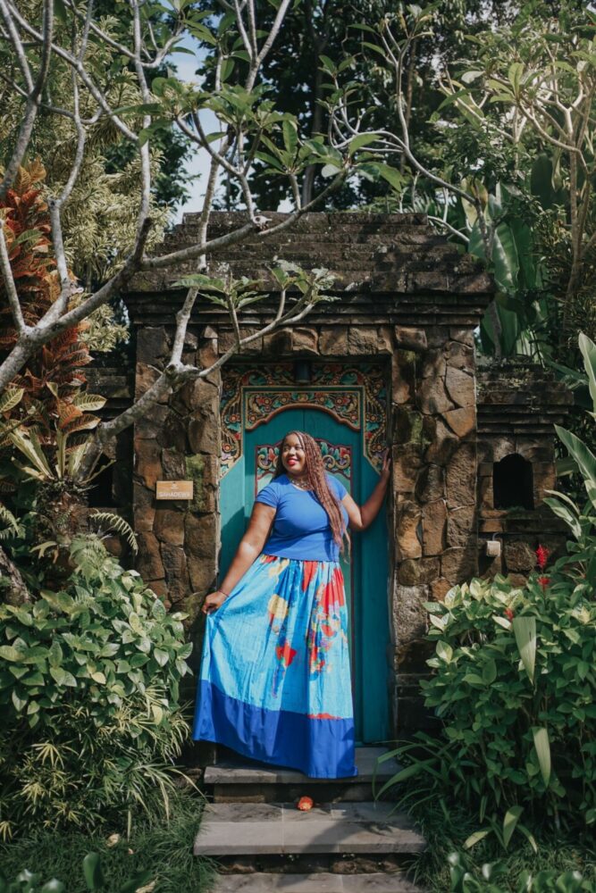 Photo of me standing in front of the entry to my private villa in Bali during my Bali Indonesia trip. 